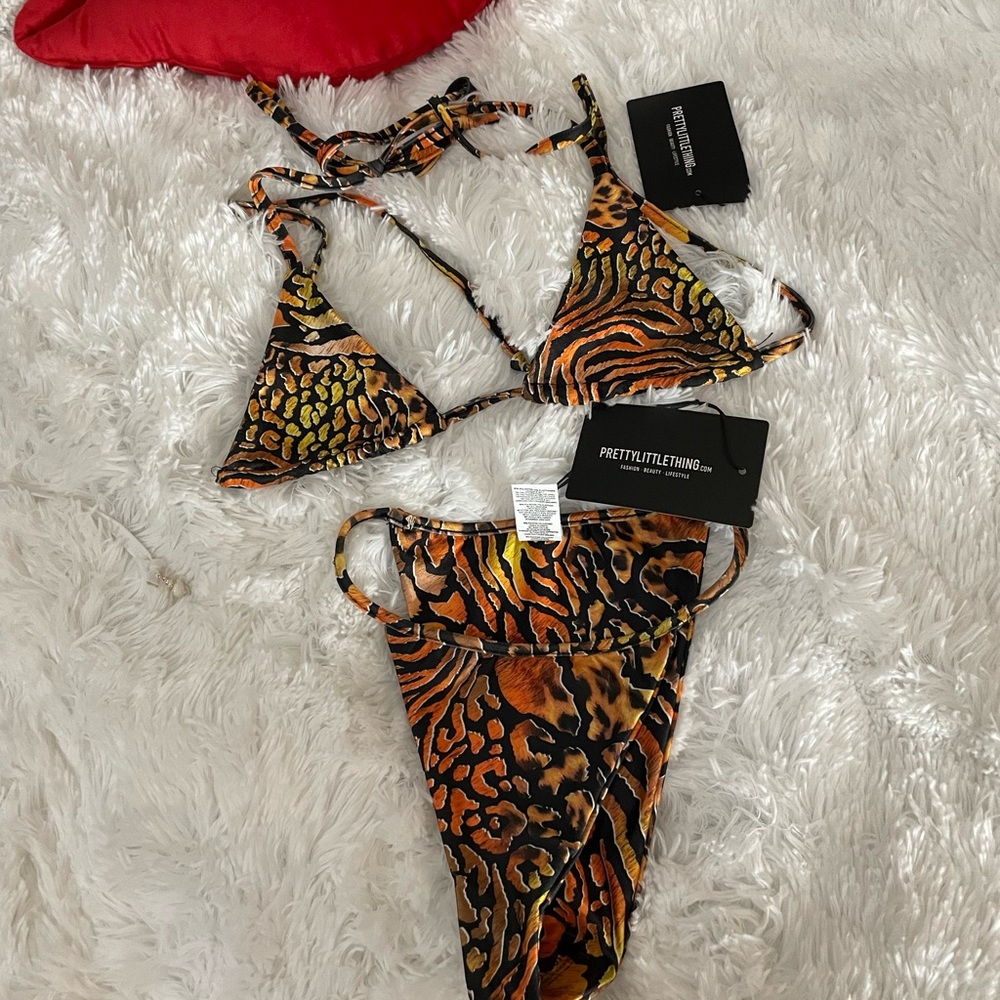 99. Black and orange bikini